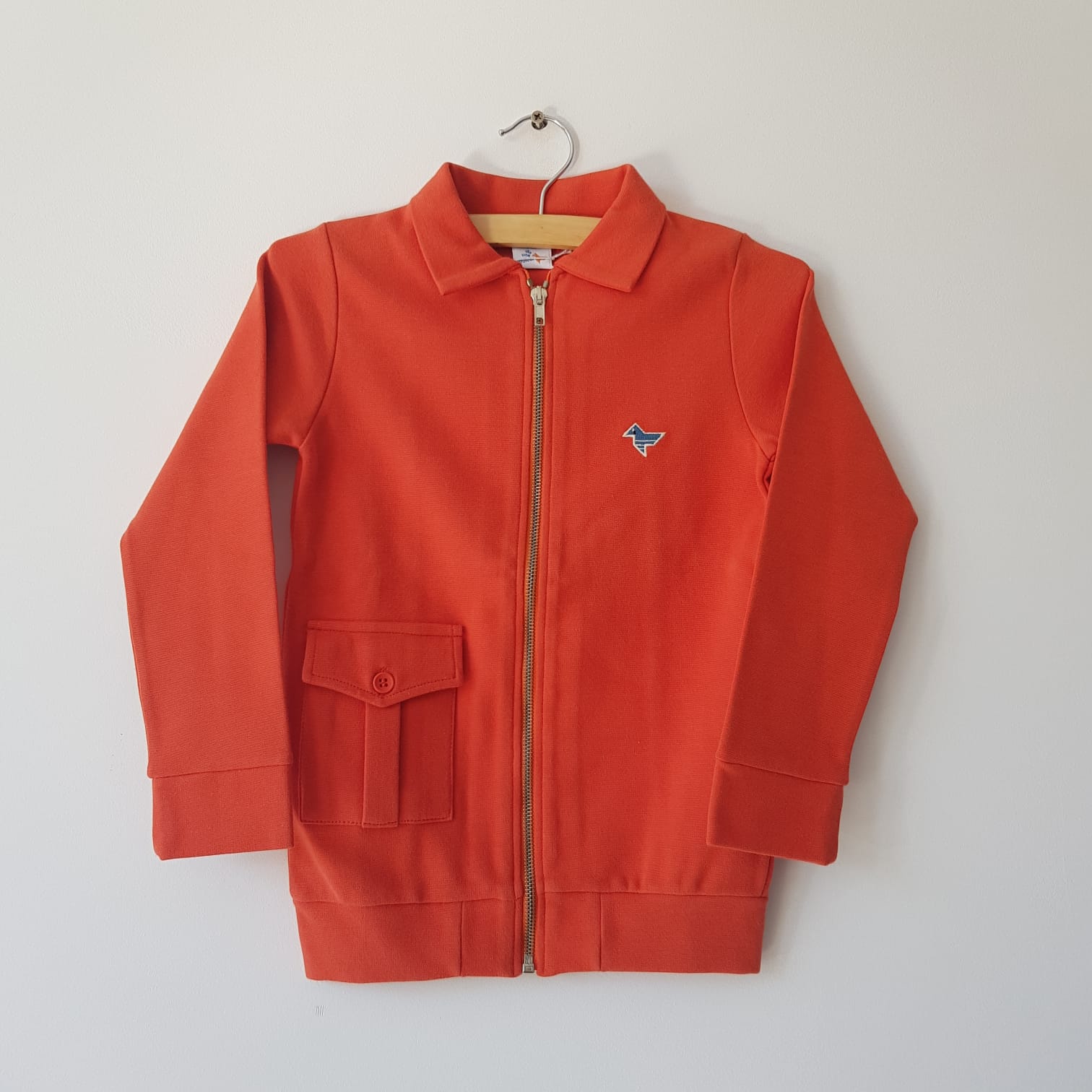 This is a Color Vest Polo Orange Zipper Bird One Pocket Orange Vest with  Blue Zipper